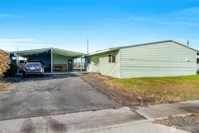 You'll enjoy a large carport and storage room attached to the home.