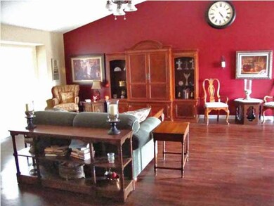 Living room, dining room, kitchen, and hallway all