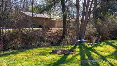 The .17 acres diagonals to the creek for a flat, shady side-yard. There is ample parking, too!