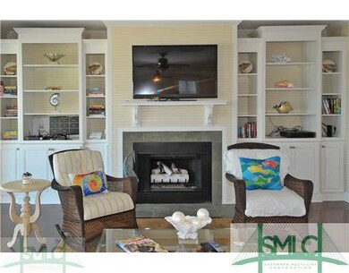 Den/Family/Great Room. Gas fireplace flanked by bu