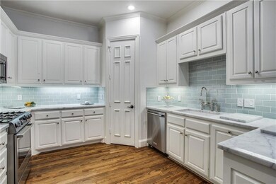 Gorgoeus Waterworks Backsplash and Carrera Marble 
