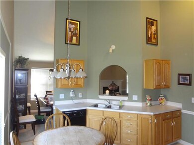 Ample counter space and the sink area looks out into the living area.  There is beautiful natural lighting that fills the kitchen area