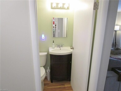 Freshly updated half bath on the main level.