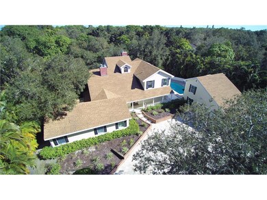Large southern home with studio above huge garage.
