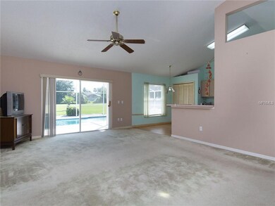 View from the front door to pool area, kitchen on 