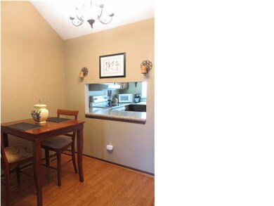 DINING AREA WITH SOARING CATHERDAL CEILINGS