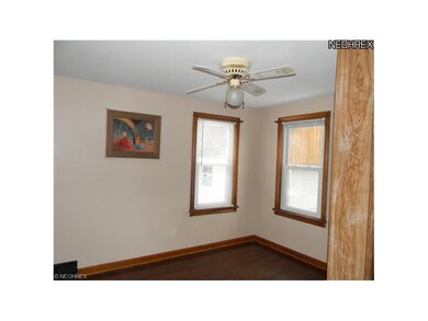 2nd bedroom with hardwood floor.
