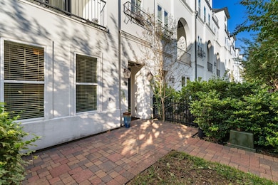 Fully fenced front patio area with green space—perfect for pets or outdoor enjoyment.