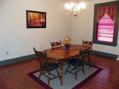 The spacious dining room has plenty of room for a 