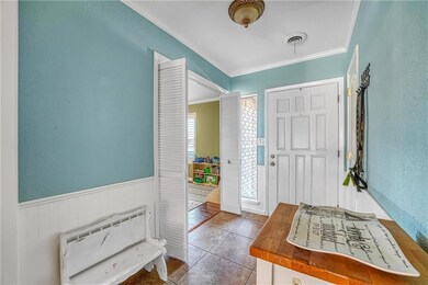 Entry with  Playroom/Formal Dining Roof Off Entry