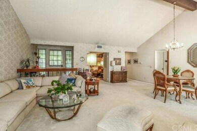View from living room towards large den with doubl