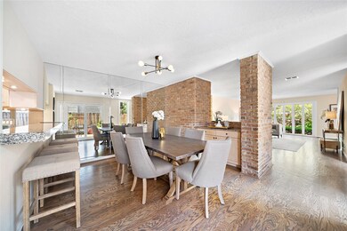 An alternate view of the dining room reveals a mir