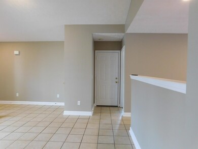 LIVING ROOM AREA WITH TILE