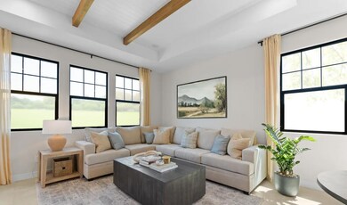 Great room with stained ceiling beams