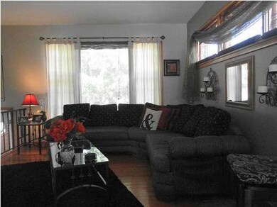LIVING ROOM WITH HARD WOOD FLOORING