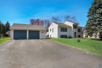 View of front of property featuring a front yard, 