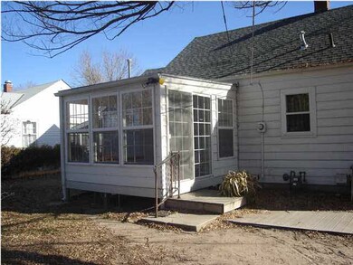 Very Nice SunRoom on the back of home. Sliding doo