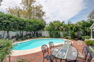 Gorgeous landscaping surrounding pool and patio