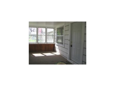 Porch. Nice enclosed front porch great for summer 