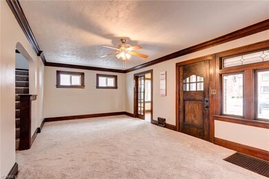 Sunroom is to the left of the front door...