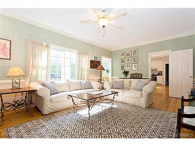 Wonderful bright family room has large window and 