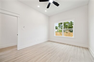 Primary bedroom, all rooms feature wood style floo