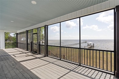 Screened in back porch  to watch those waterfront sunsets!!