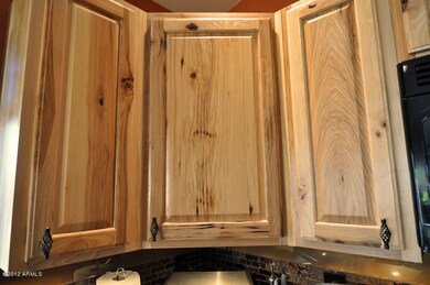 13006 Mandalay_Kitchen_Knotty Pine Cabs
