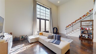 Den with Large windows that fill the room with Nat