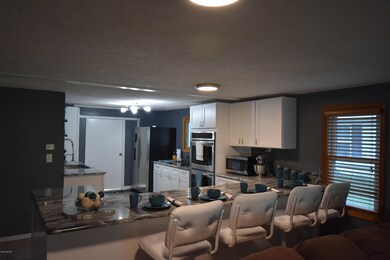 10426 Oakland Dr, Portage, MI 49024 - photo 4