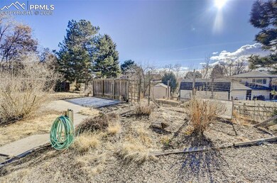 xeriscaped yard with patio and fenced in garden be