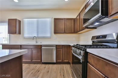Kitchen featuring appliances with stainless steel