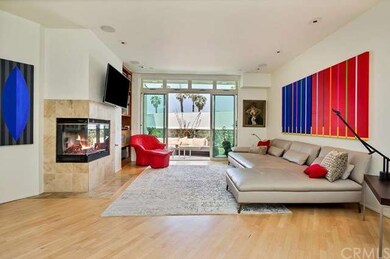 Sleek and modern, the living area is light, bright