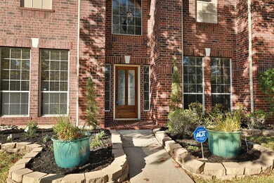Beautiful leaded front door and dramatic entry.