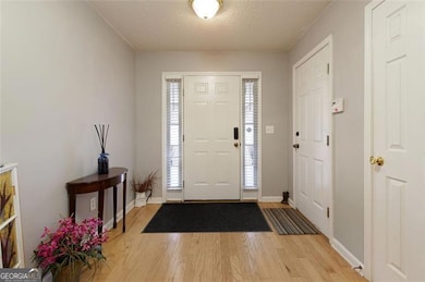 Foyer with hardwood floors
