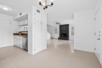 Kitchen featuring light tile patterned floors, vi