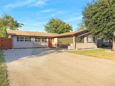 Single story home with a garage