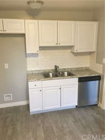 Brand new cabinets and stainless steel dishwasher.