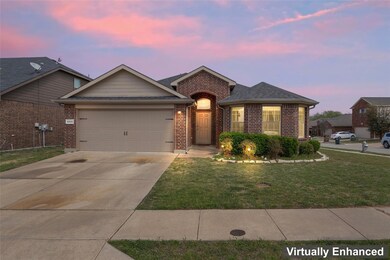Single story home with concrete driveway, roof wit