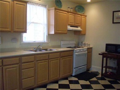 Kitchen. Updated eat-in kitchen with maple cabinet