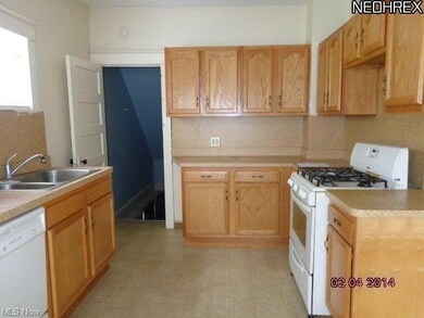 Kitchen with newer oak cabinets
