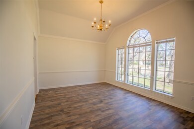 Formal dining located off entry