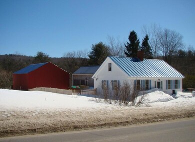 Side view of home w/screened porch...