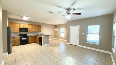 A view from the door entry that leads to the side of the home and backyard