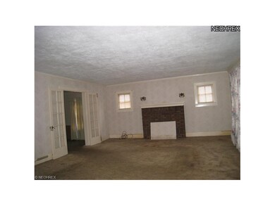 Living room with fireplace.