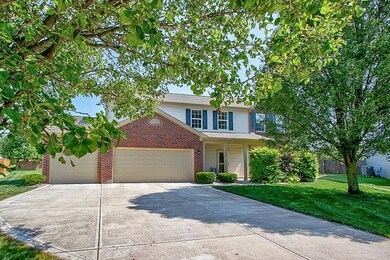 3 car garage, mature trees