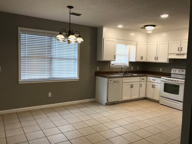 Open concept kitchen/living/dining