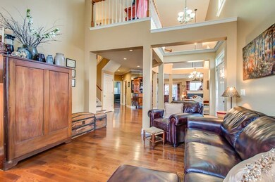 Living room fully open to dining room and kitchen.