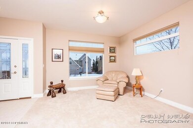 Living room faces inlet to the west