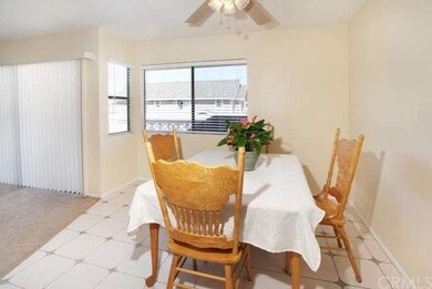 Dining area with views to balcony, light and airy.